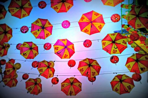 umbrellas lanterns sky