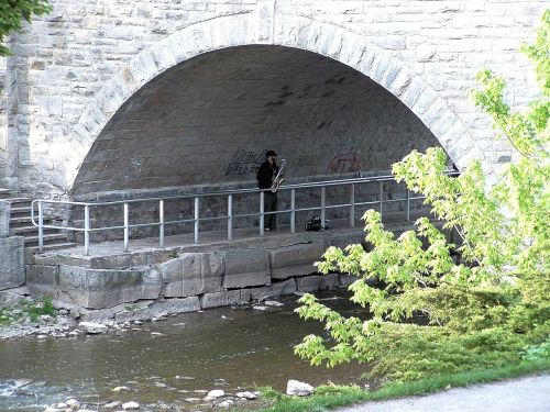 under a bridge river saxophone