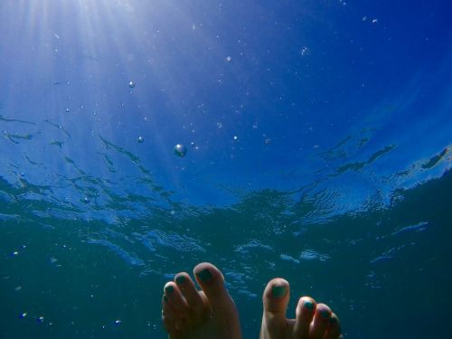 underwater feet water