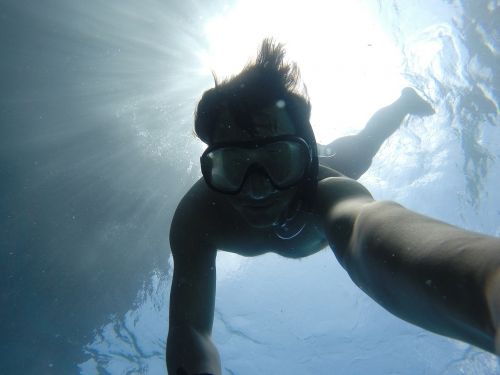 underwater snorkeling man