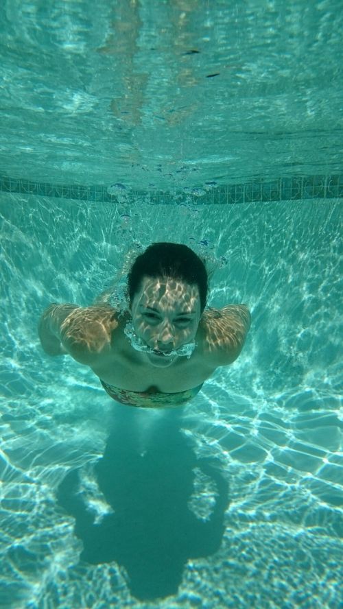 underwater swimming girl