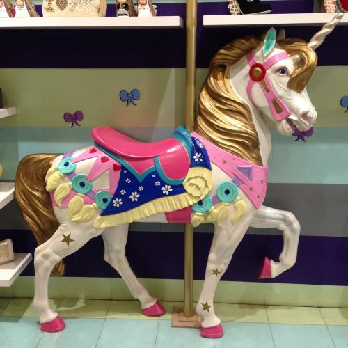 unicorn carousel kitsch