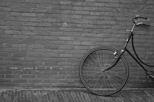upright bicycle wall city