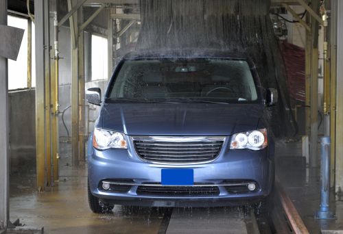 Van Going Through Car Wash