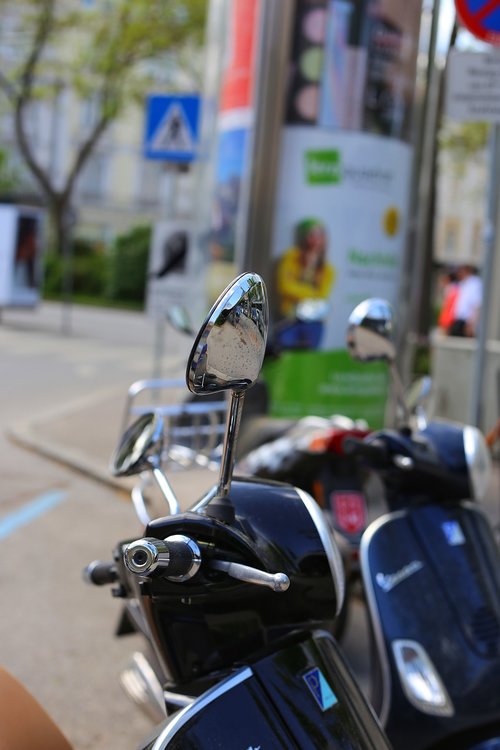 vespa  blue  moped