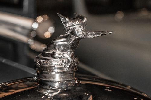 vintage hood ornament silver
