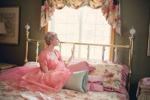 vintage woman on bed retro