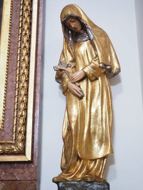 virgin mary golden figure