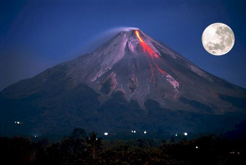 volcano erupting full moon