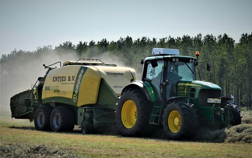 wage operating  landscape  tractor