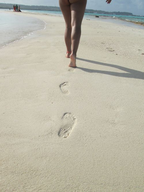 walk footprints beach