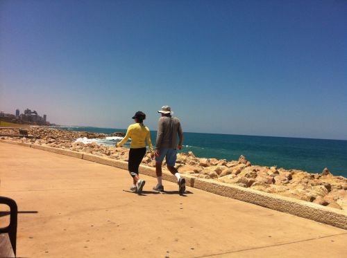 Walking Along The Promenade