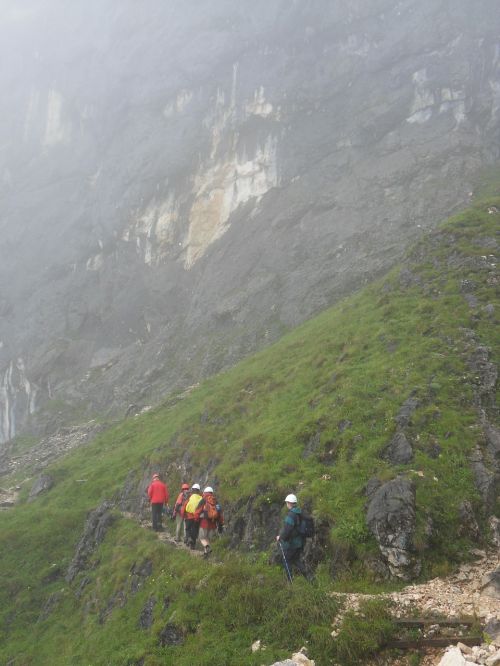 wanderer hiking fog