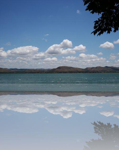 Water And Clouds Reflected