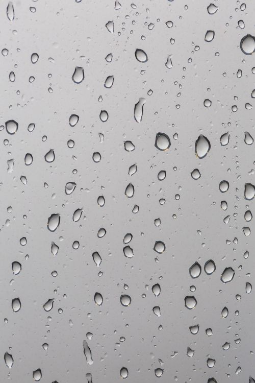 water drops raindrops windowpane
