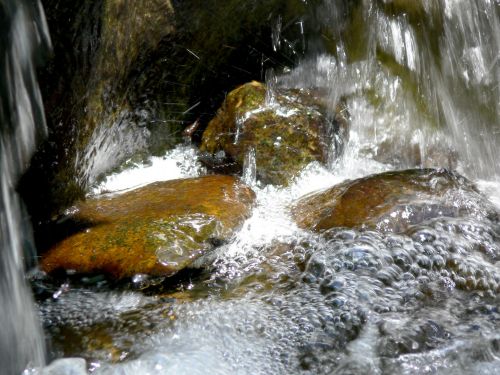 Water Falling On Rocks