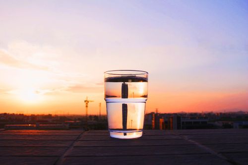 water glasses sunset campus