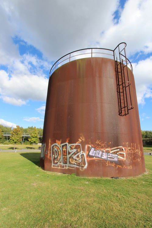 water tower rusty grafitti