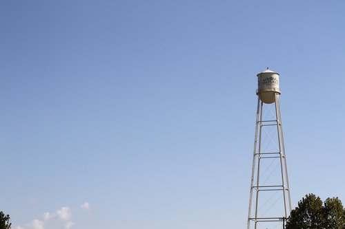 water tower  small texas city  next to sugar factory