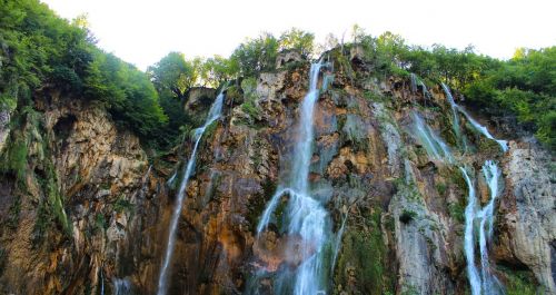 waterfall nature cliff