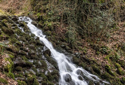 waterfall  volcanic stones  water