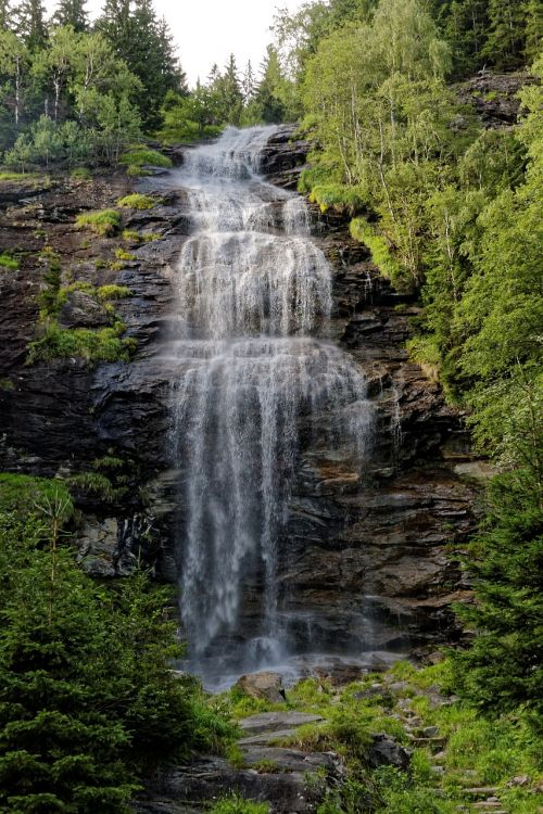 waterfall alpine mountains