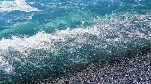 wave beach pebbles