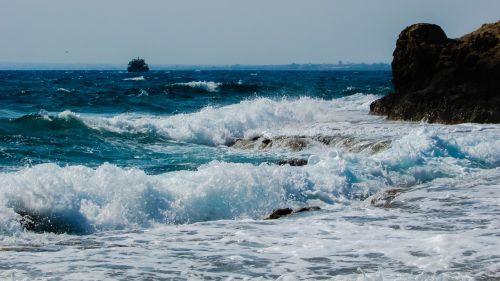 wave smashing rocky coast