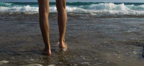 wave feet sea