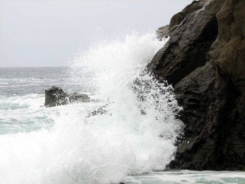 wave crashing wave ocean