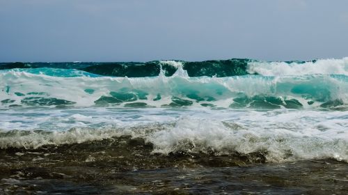 wave smashing beach