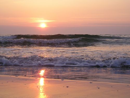 wave sunset baltic sea