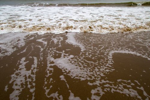 Wave On The Sea On The Sand Beach