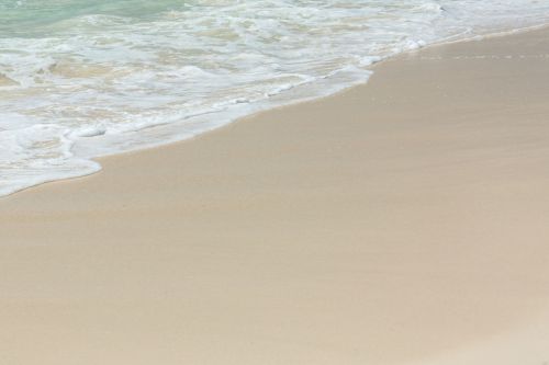 Wave On White Beach