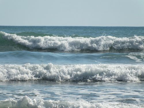 waves sky beach