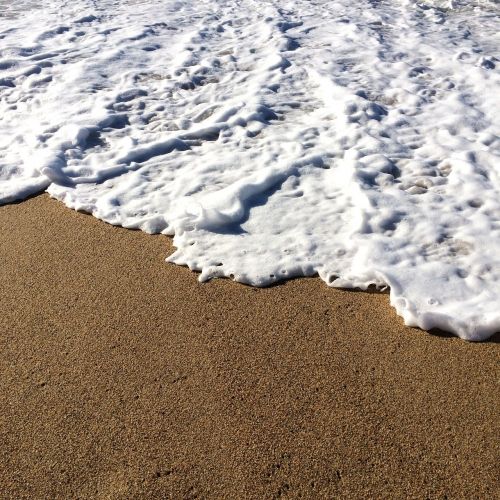 waves sand beach