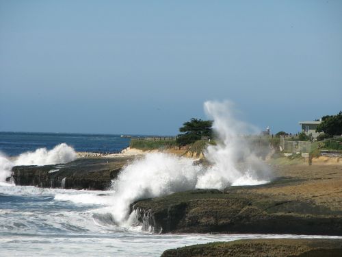 waves crashing beach