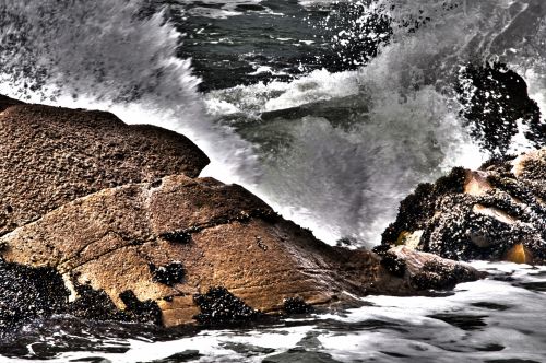 Waves Crashing On Rock