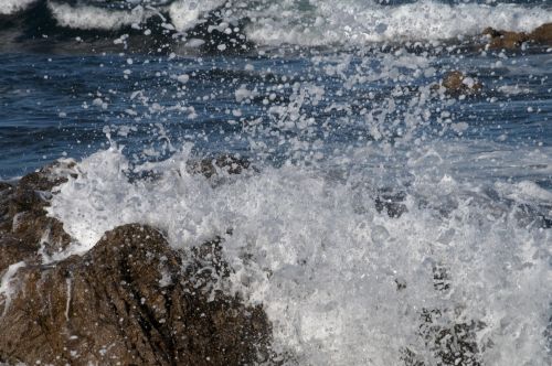 Waves Crashing On Rocks