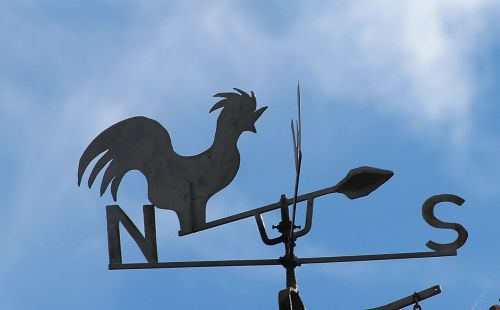 weather vane blue sky west