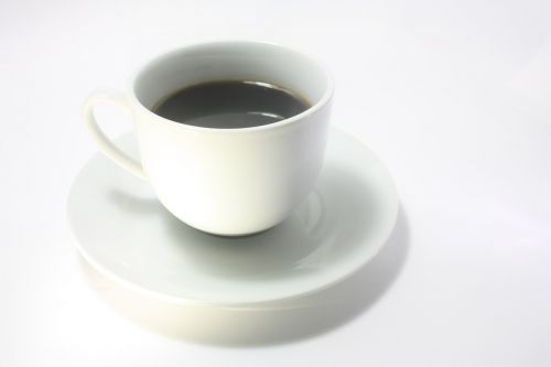 white cup saucer