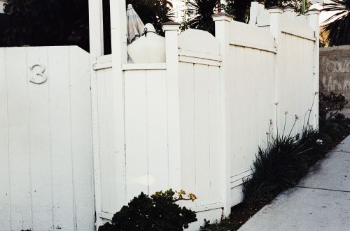 white gate fence