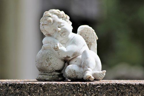 white angel  sleeping  statue