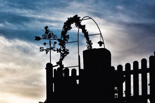 wind vane evening silhouette