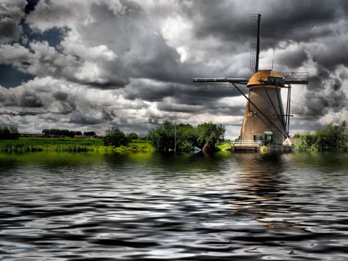 windmill clouds water