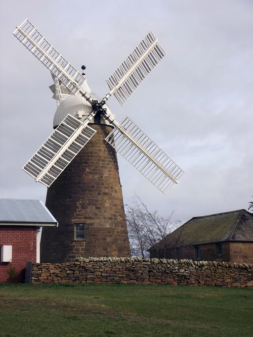 windmill  clouds  barn
