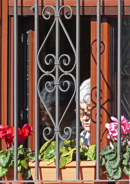 window grating older person