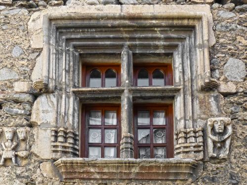 window sculpted stone medieval