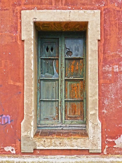 window old peeling paint