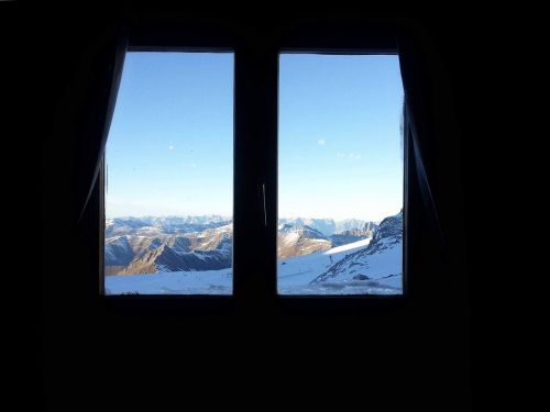 window mountains glacier
